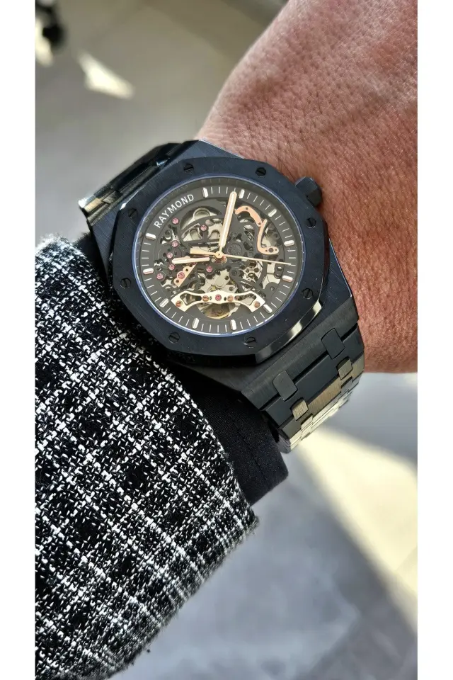 Raymond Erkek Kol Saati RYM-1012-R50  Çelik Kordon