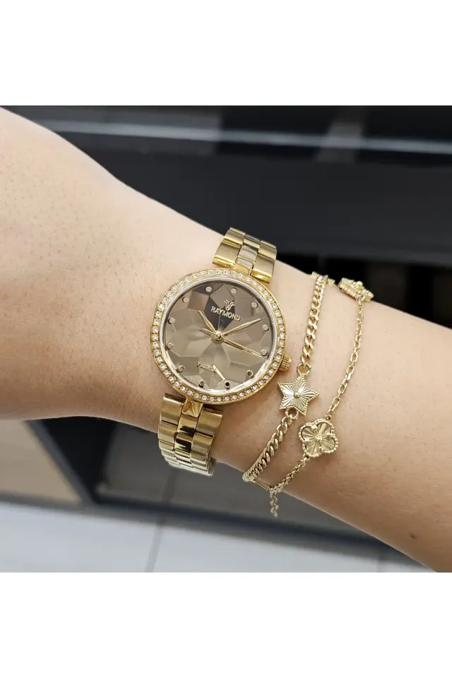 Rym-211702 Paslanmaz Çelik - 2 Yıl Garanti - Raymond Kadın Kol Saati AGOLD